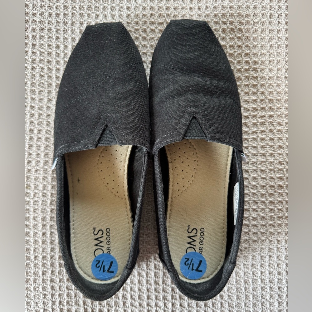 Toms Black Canvas Slip-Ons